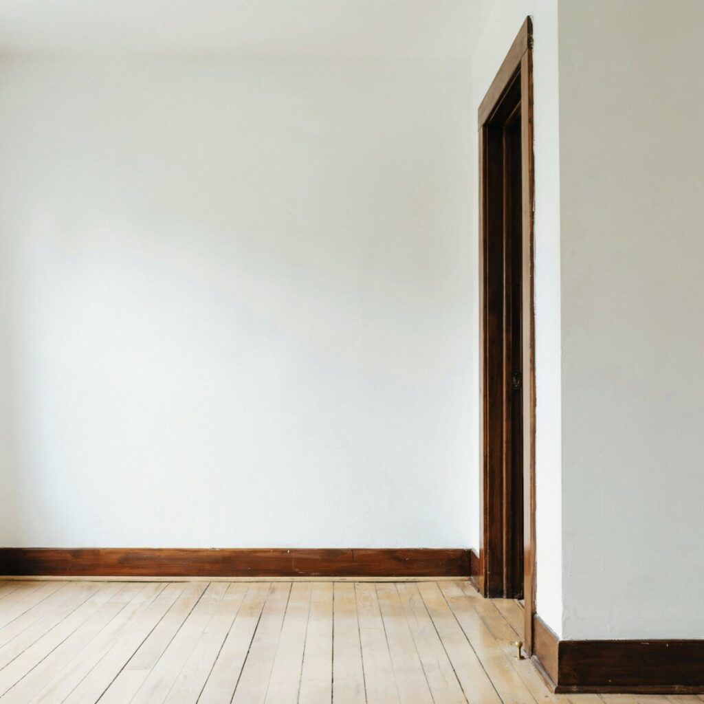 Dark Wood Trim and Molding on Crisp White Walls
